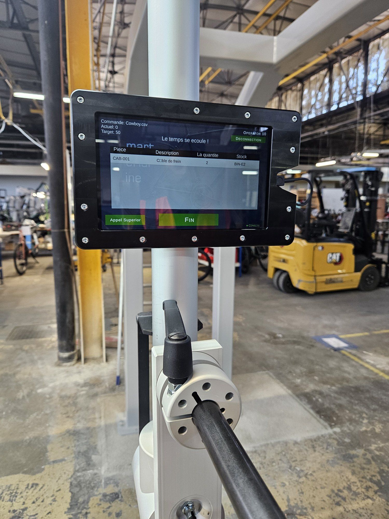 The operator terminal mounted on a post of The Line, showing the current operation